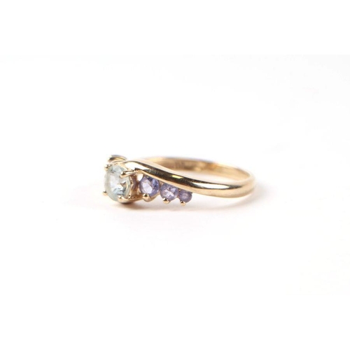 504 - A 9ct gold gem set dress ring, approx UK size 'N', 2.3g.