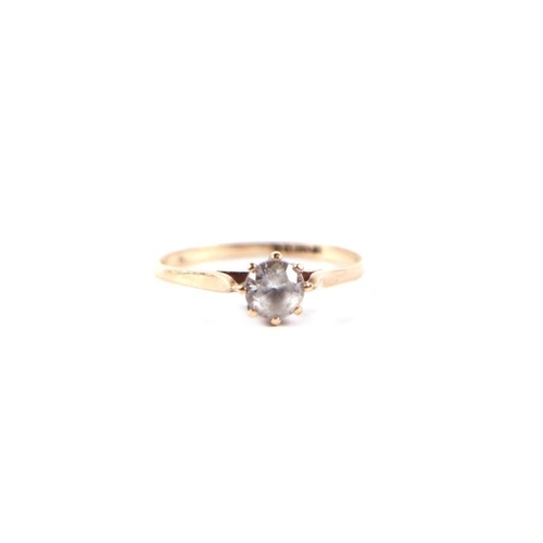 532 - A 9ct gold white sapphire solitaire ring, approx UK size 'N', 1.4g.