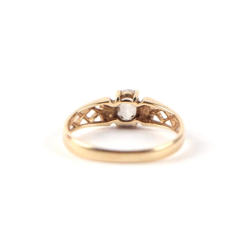 539 - A 14ct gold and white stone solitaire ring, approx UK size 'O', 2g.