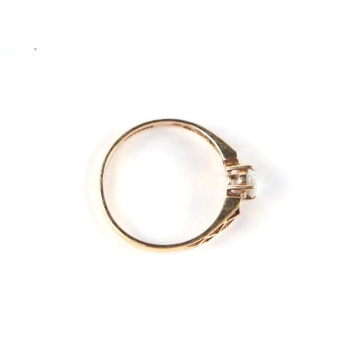 539 - A 14ct gold and white stone solitaire ring, approx UK size 'O', 2g.