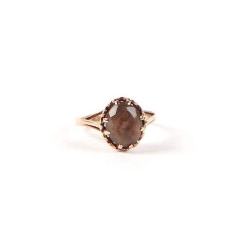 546 - A 9ct gold and smoky quartz solitaire ring, approx UK size 'L', 2.1g.