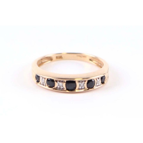 551 - A 9ct gold diamond and sapphire ring, approx UK size 'L', 2g.