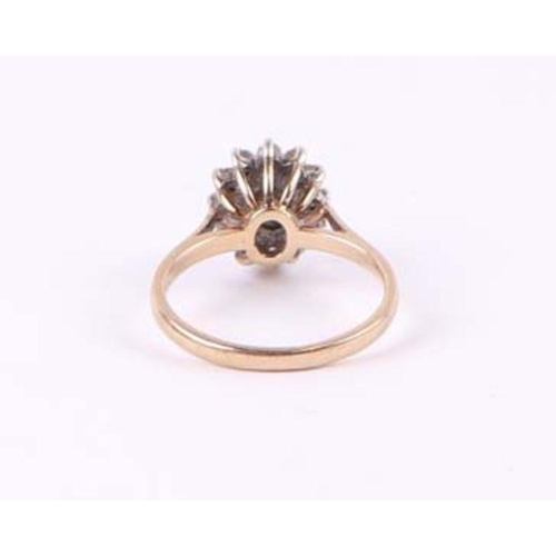 561 - A 9ct gold cluster dress ring, approx UK size 'N', 3g.