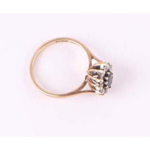 561 - A 9ct gold cluster dress ring, approx UK size 'N', 3g.