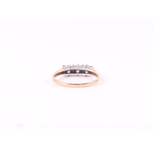 564 - A 9ct gold sapphire and cubic zirconia ring, approx UK size 'P', 1.7g.