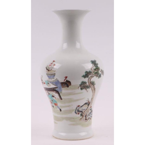 581 - A Chinese baluster vase decorated with figures in a landscape, six character mark to base, 25cms hig... 