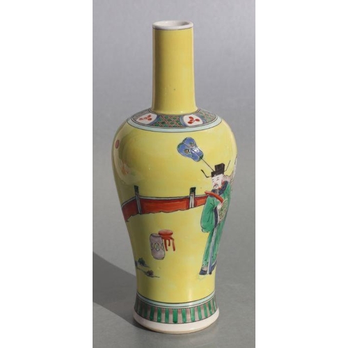 582 - A Chinese bottle vase decorated with figures in a landscape, on a yellow ground, 27cms high. Conditi... 