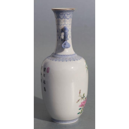 584 - A Chinese republic style famille rose two-handled vase decorated with bamboo and roses, four charact... 