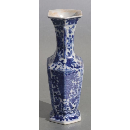 585 - A Chinese blue & white hexagon form two handled vase decorated with ladies on terraces, 23cms hi... 