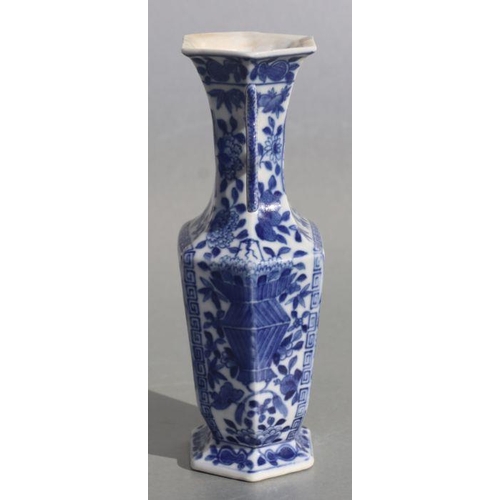 585 - A Chinese blue & white hexagon form two handled vase decorated with ladies on terraces, 23cms hi... 