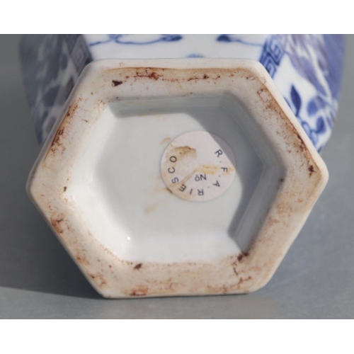 585 - A Chinese blue & white hexagon form two handled vase decorated with ladies on terraces, 23cms hi... 