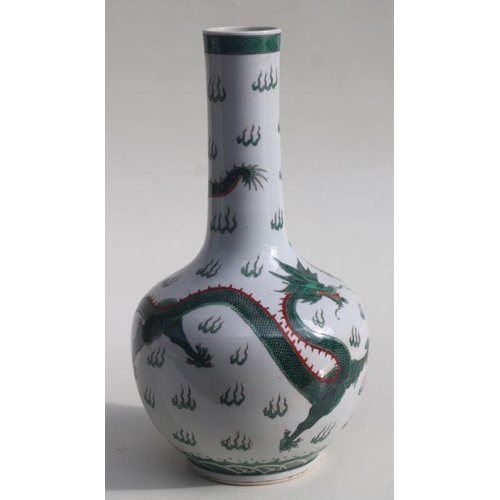 586 - A Chinese famille verte bottle vase decorated with dragons chasing a flaming pearl, blue character m... 