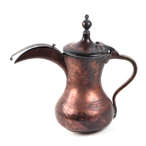 588 - A Turkish / Islamic copper dallah coffee pot, 27cms high.