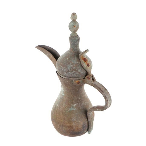 589 - A Turkish / Islamic brass dallah coffee pot, 30cms high.