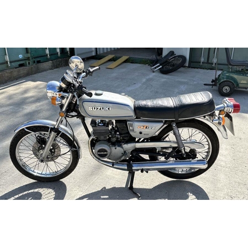 59 - A 1975 Suzuki GT125, registration no.  KAJ 138N, frame no.  GT12542594, engine no.  51819, silver.  ... 