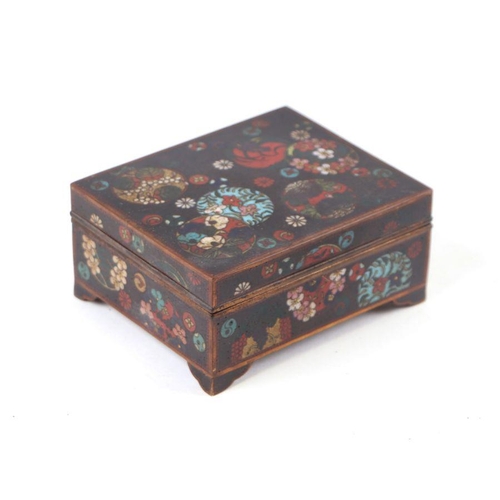 619 - A late 19th century Japanese cloisonné box and cover decorated with butterflies and flowers, on a bl... 