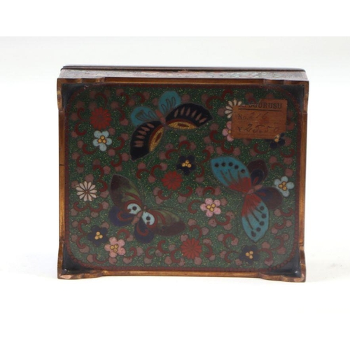 619 - A late 19th century Japanese cloisonné box and cover decorated with butterflies and flowers, on a bl... 