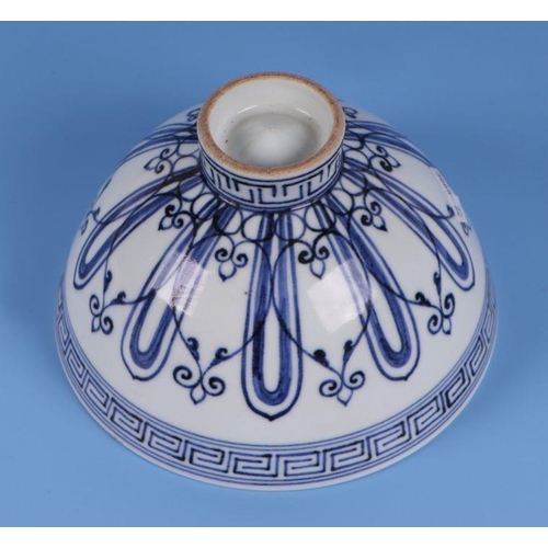 641 - A Chinese blue & white footed bowl, 9cms high.