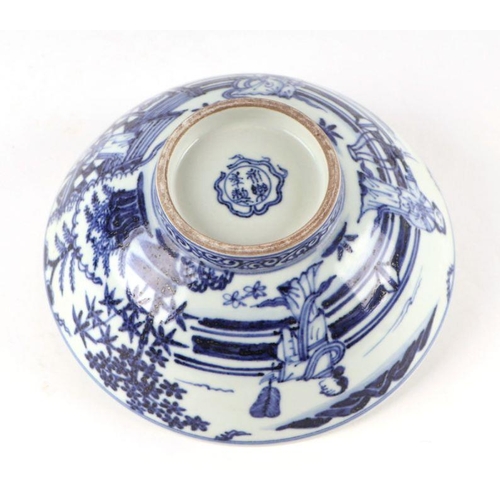 644 - A Chinese blue & white footed bowl decorated with figures in a landscape, four character blue ma... 