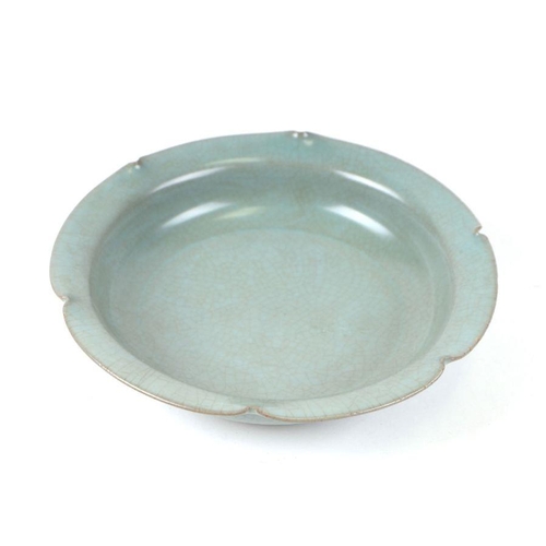 649 - A Chinese lotus flower form celadon crackle ware glaze bowl, 20cms diameter.