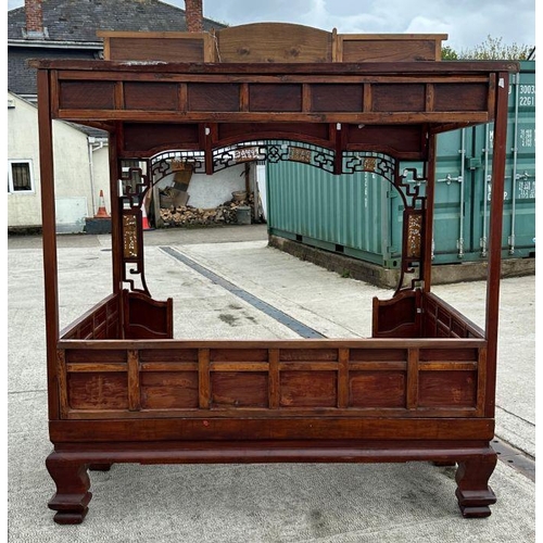 659 - An impressive Chinese elm wood marriage bed.