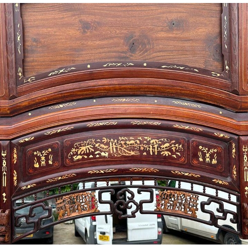 659 - An impressive Chinese elm wood marriage bed.