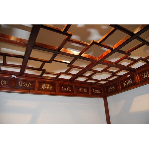 659 - An impressive Chinese elm wood marriage bed.