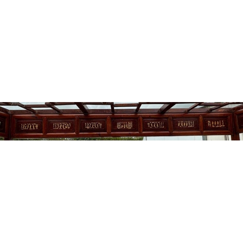 659 - An impressive Chinese elm wood marriage bed.