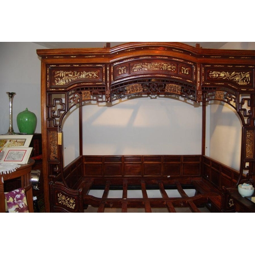 659 - An impressive Chinese elm wood marriage bed.