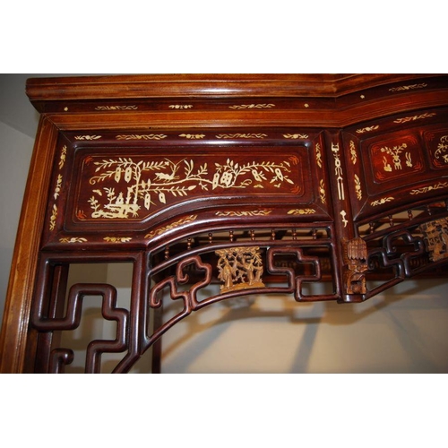 659 - An impressive Chinese elm wood marriage bed.