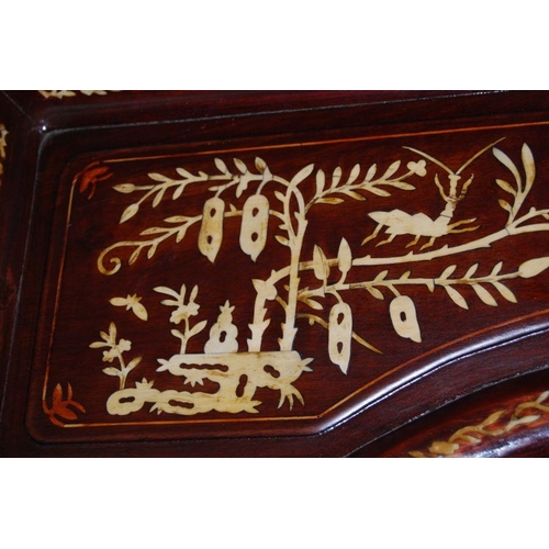 659 - An impressive Chinese elm wood marriage bed.