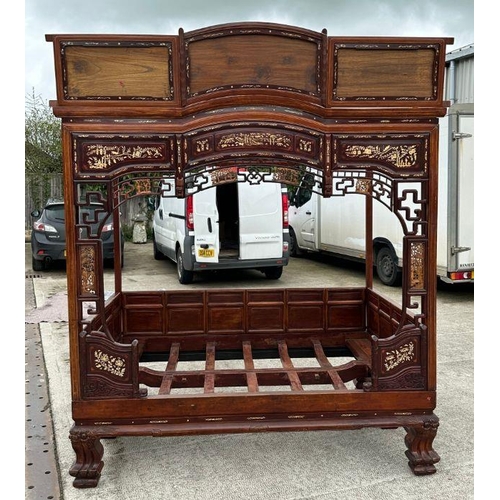 659 - An impressive Chinese elm wood marriage bed.