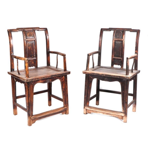 668 - A pair of Chinese elm elbow chairs, the splat with four character mark to the reverse (2).