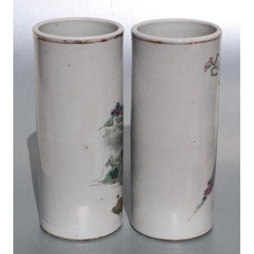 678 - Two pairs of Chinese Republic style famille rose wig stands or cylinder vases, decorated with figure... 