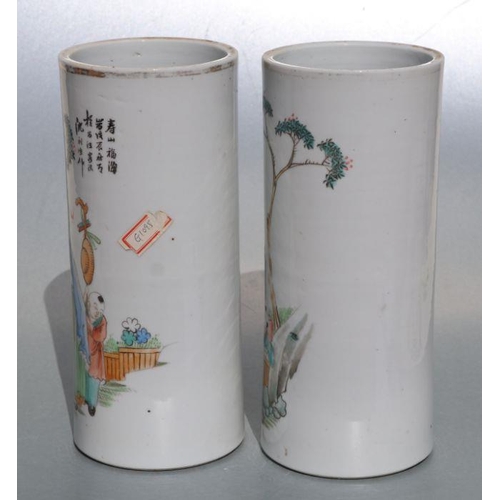 678 - Two pairs of Chinese Republic style famille rose wig stands or cylinder vases, decorated with figure... 