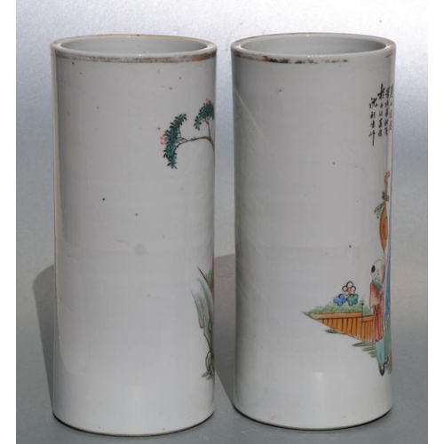 678 - Two pairs of Chinese Republic style famille rose wig stands or cylinder vases, decorated with figure... 