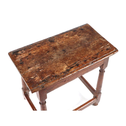 741 - A 19th century style oak joint stool, 53cms wide' together with an oak corner table, 61cms wide (2).