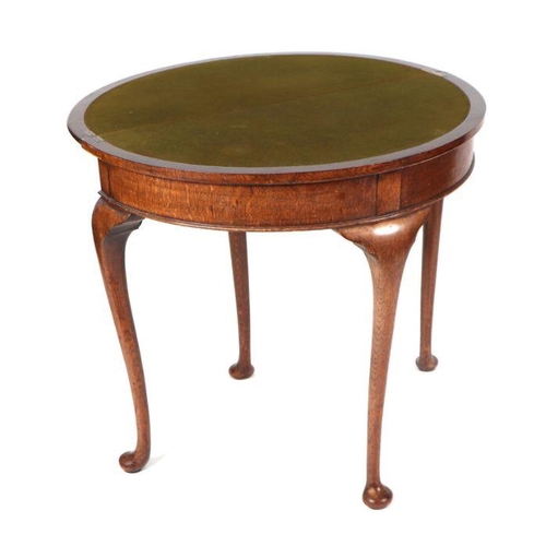 751 - An early 20th century George III style oak demi-lune fold-over card table, on cabriole legs terminat... 