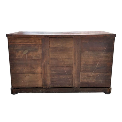 762 - A 19th century flame mahogany sideboard or chiffonier with three frieze drawers above panelled doors... 