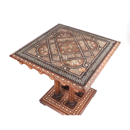 773 - A Middle Eastern / Syrian hardwood centre table, the rectangular top with ivory inlaid decoration, o... 