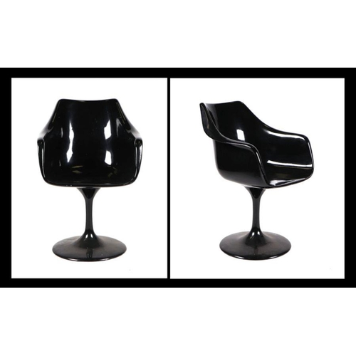 776 - A pair of Charles & Ray Eames style shell chairs on swivel tulip bases (2).