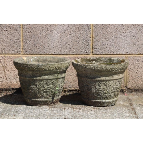 8 - A pair of reconstituted stone circular planters, 34cms diameter (2).