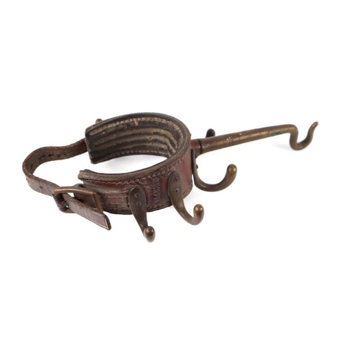 87 - A late 19th / early 20th century Securem Campaign leather and brass tent pole clothes hook, stamped ... 