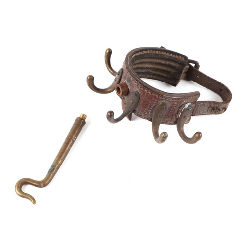 87 - A late 19th / early 20th century Securem Campaign leather and brass tent pole clothes hook, stamped ... 