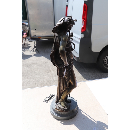 396 - A French bronzed spelter figure 'Commerce', stamped 'H Dumaige', 71cms high.