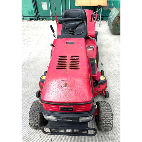 25A - A Westwood T1600 ride-on petrol lawn mower, together with grass collection box.