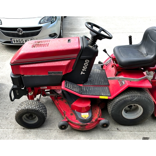 25A - A Westwood T1600 ride-on petrol lawn mower, together with grass collection box.