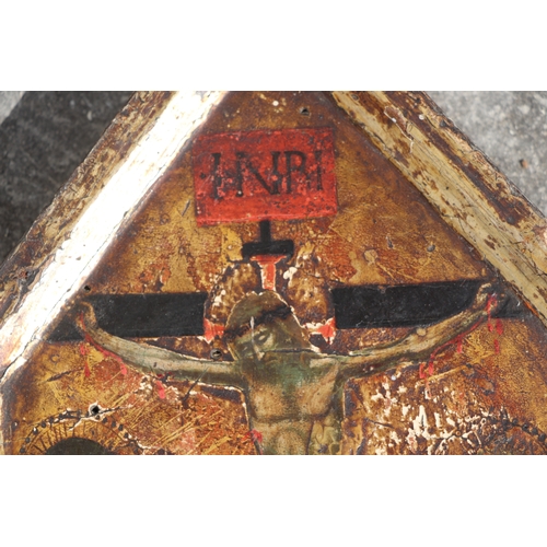 366 - A painted wooden icon depicting the crucifixion of Christ, on a gilt ground, 18 by 29cms.