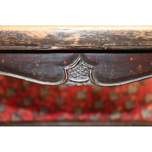 668 - A pair of Chinese elm elbow chairs, the splat with four character mark to the reverse (2).