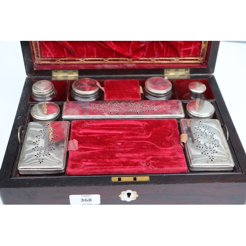 368 - A 19th century rosewood dressing box, the fitted interior with silver plated cosmetic jars and jewel... 